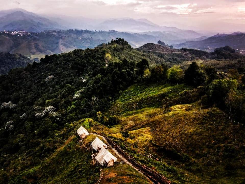 Mountain landscape with forest and cabins in the Colombian mountains